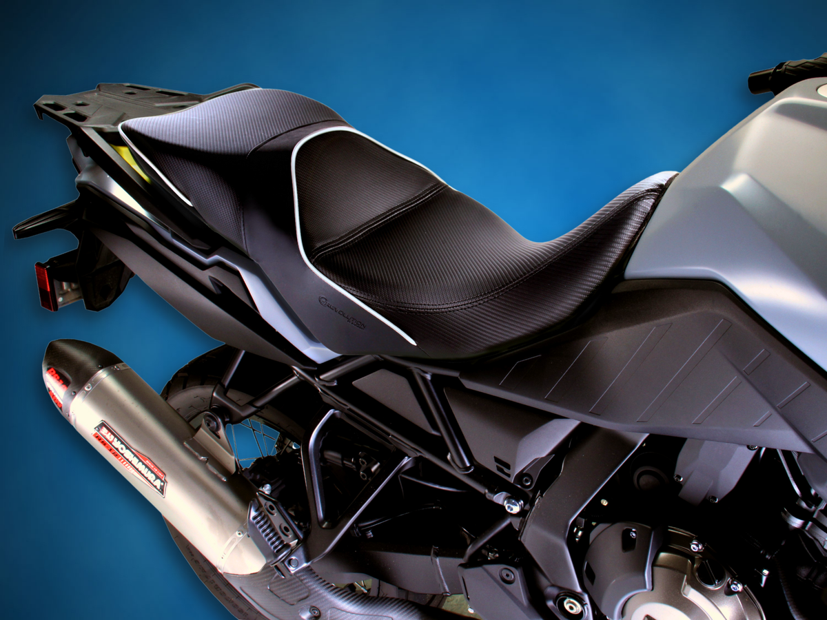 Sargent Cycle Products' REVolution OEM Motorcycle Seat Upgrade for the Suzuki V-Strom 800 2023+ shown with CFX, silver welt, regular height on the motorcycle.